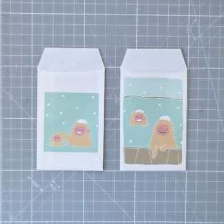 sobres pochi - mono de nieve